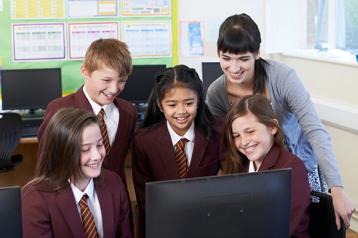 Teacher and students watching